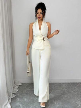 SHEIN Elenzya طقم قطعتين للنساء من توب قصير بدون أكمام وتنورة بلون أحادي مع تصميم ملفوف أمامي