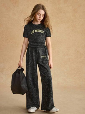 SHEIN Sparklyn طقم تي شيرت للبنات، تي شيرت أسود ضيق بأكمام قصيرة وبنطال فضفاض واسع الساق، من قماش محبوك ناعم، مناسب للارتداء اليومي والرياضة والعطلات، مجموعة صيفية جديدة