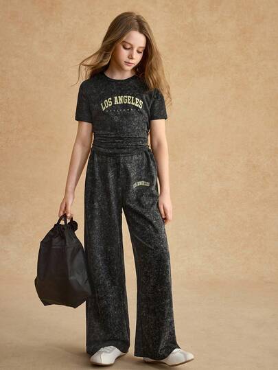 SHEIN Sparklyn طقم تي شيرت للبنات، تي شيرت أسود ضيق بأكمام قصيرة وبنطال فضفاض واسع الساق، من قماش محبوك ناعم، مناسب للارتداء اليومي والرياضة والعطلات، مجموعة صيفية جديدة