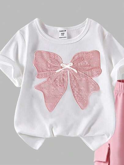 SHEIN ChillGRL مجموعة من قطعتين للفتيات المراهقات، تصميم كاجوال بفيونكة وطباعة، قميص طباعي وبنطلون رياضي، أزياء موضة مناسبة للربيع والصيف