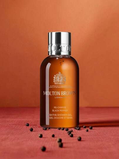 Molton Brown غسول الجسم بالفلفل الأسود، 50 مل، رغوة غنية، قوام جيلي، سهل الشطف، عطر حادّ خشبي، منشط، تنظيف عميق، ترطيب لطيف، مُنكّه بمستخلصات نباتية، 50 مل/1.69 أونصة سائلة
