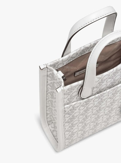 Michael Kors حقيبة كروسبودي صغيرة، تصميم جاكارد أنيق، نمط معقود بشكل معين، رمادي داكن، فاخرة ومتينة، مثالية للاستخدام اليومي. حقيبة يد عصرية مع حزام كتف قابل للتعديل، مصنوعة بعناية، داخل فسيح، مثالية لتخزين الضروريات.
