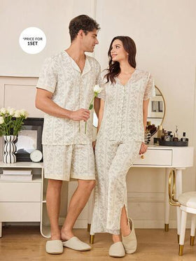 SHEIN طقم بيجامة رجالي قصير الأكمام مع طباعة زهور الوستريا