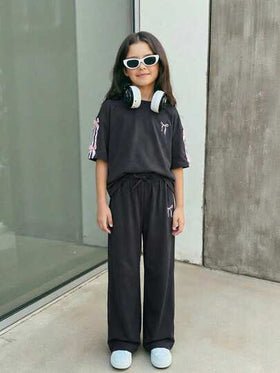 SHEIN Firerie Kids مجموعة تي شيرت فضفاض مطبوع مع فيونكة وبنطلون للبنات المراهقات، موضة كاجوال مريحة للاستخدام اليومي، قطعتان