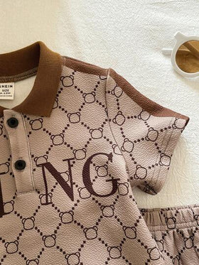 SHEIN مجموعة قميص بولو كاكي بأكمام قصيرة وشورت للأطفال الصغار 2 قطعة، ملابس صيفية للأولاد الرضع