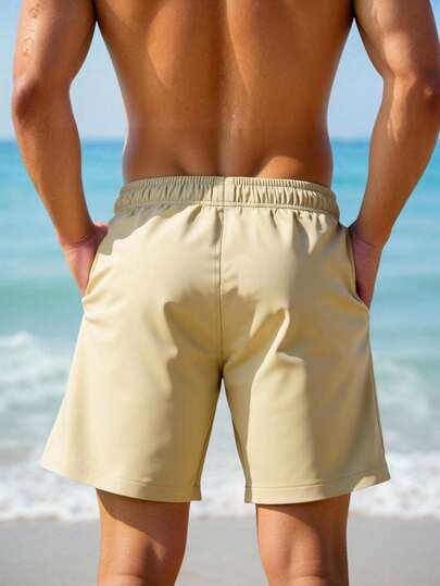 Manfinity Swimmode شورت كاجوال للشاطئ والعطلات مطبوع عليه أشجار جوز الهند مع خصر مرن وجيوب