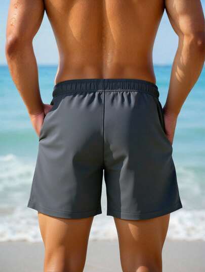 Manfinity Swimmode شورت كاجوال للشاطئ والعطلات مطبوع عليه أشجار جوز الهند مع خصر مرن وجيوب