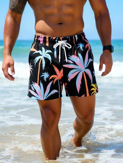 Manfinity Swimmode شورت كاجوال للرجال بطبعة نباتية وجيب مائل وخصر بسحاب للعطلات والشاطئ