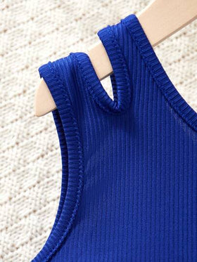 SHEIN طقم ملابس كاجوال للفتاة الصغيرة يتكون من ملابس علوية لون سادة وبنطال واسع الساق مطبوع بنقشة الزهور للارتداء اليومي والعطلات