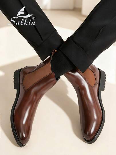 Salkin بوت تشيلسي الرجالية الفاخرة بتصميم الكاحل متوسط الارتفاع، من الجلد الطبيعي الناعم، بتصميم رأس مدبب، مناسبة للأعمال الرسمية والمناسبات الكاجوال، هدية رومانسية لعشاء الزوجين، وأحذية للطلاب في المدرسة والكلية، ننصح باختيار مقاس أكبر بمقدار مقاس واحد