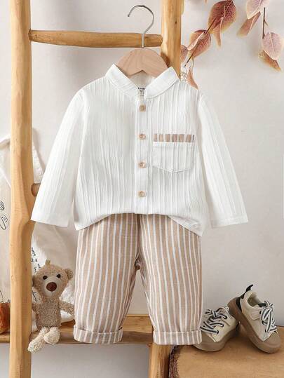 SHEIN Vintaside Kids ملابس علوية أطفال ذو أكمام قصيرة وياقة مع أزرار وجيوب، مع شورت ذو خصر مطاطي، طقم ملابس كاجوال فضفاض مريح، وصول جديد للصيف، قطعتان