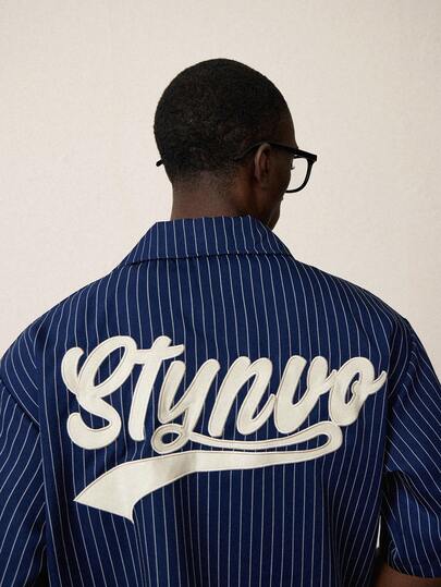 STYNVO قميص كاجوال للرجال بأكمام قصيرة مطرز بخطوط وحرف