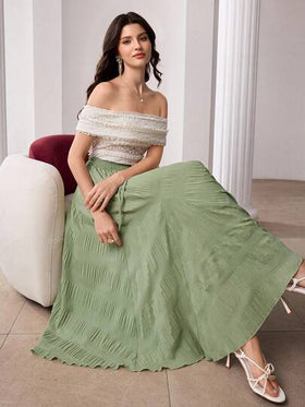 Modelyn تنورة خضراء ناعمة ذات خصر مطاطي مائل وقصة غير متماثلة، أنيقة