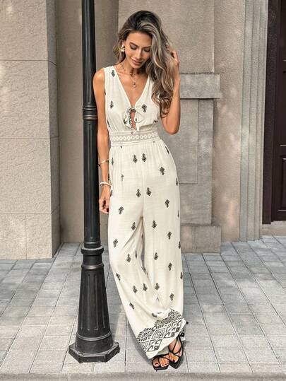 SHEIN PariChic جمبسوت نسائية جديدة بياقة عميقة على شكل حرف V بدون أكمام وخصر مشدود وطباعة وساق واسعة