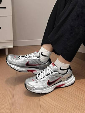 Nike حذاء نايكي إنيشياتور أنيق، يسمح بالتهوية، متين، منخفض الرقبة، مناسب للتنقلات اليومية في المدينة، للرجال، أسود/فضي