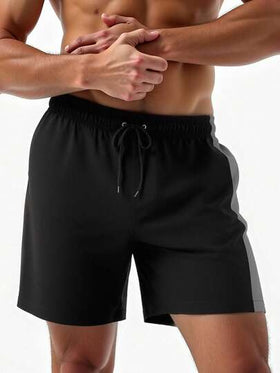 Manfinity Swimmode شورت شاطئ فضفاض للرجال مع خصر مرن وجيوب مائلة، مناسب للصيف والعطلات على الشاطئ