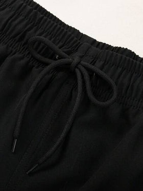 Manfinity Swimmode شورت شاطئ فضفاض للرجال مع خصر مرن وجيوب مائلة، مناسب للصيف والعطلات على الشاطئ