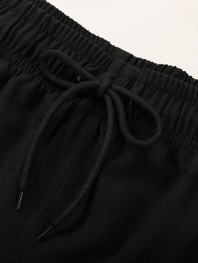 Manfinity Swimmode شورت شاطئ فضفاض للرجال مع خصر مرن وجيوب مائلة، مناسب للصيف والعطلات على الشاطئ
