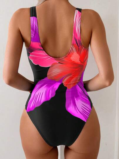 Swim Basics بدلة سباحة أنيقة للنساء بطبعة زهور كبيرة متعددة الألوان، رقبة دائرية وساق طويلة، مناسبة للصيف