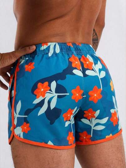 Manfinity Swimmode شورتات شاطئ رجالية مطبوعة بالزهور مع خصر رباط وجيوب، بدلة سباحة مطابقة للرجال، بدلة سباحة للرجال، ملابس شاطئ للرجال، شورتات سباحة رجالية، بدلة سباحة رجالية أزرق بنقشة زهور، مجموعة بدلة سباحة رجالية بنقشة الزهور