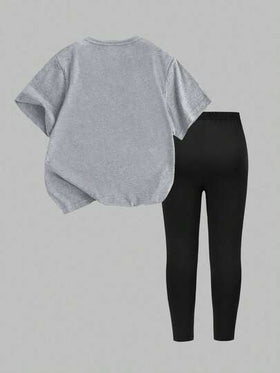 SHEIN Sparklyn مجموعة بقطعتين لفتيات، تي شيرت بطباعة رسومات وسروال ليغينغز بفيونكة، ملابس كاجوال أنيقة مريحة للارتداء اليومي في الصيف والخريف