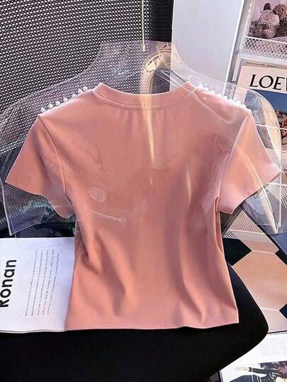 SHEIN بلوزة قصيرة الأكمام بياقة مستديرة مصنوعة من الأقمشة المحبوكة للمراهقات، باللون الوردي مع حبيبات بيضاء أنيقة وعملية، مناسبة للربيع والصيف