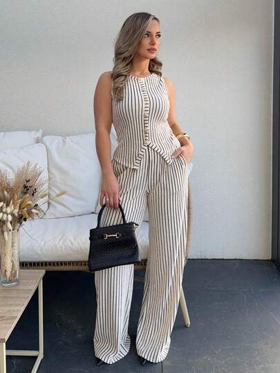 Jeta Ari مجموعة نسائية عصرية من قطعتين ذات لون أحادي وملمس متناسق، تشمل ملابس علوية خزانة بأكمام قصيرة وأزرار وبنطال واسع بخصر عالي وساق مستقيمة، طراز أنيق للتنقل
