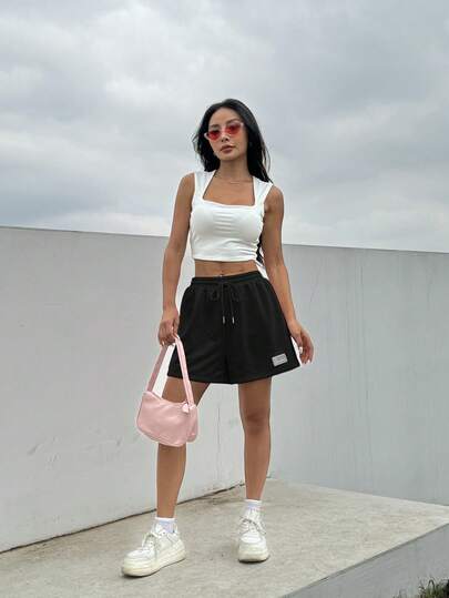 SHEIN EZwear شورت رياضي واسع باللون الوردي وخصر قابل للشد وتفصيل الرقع الصيفي