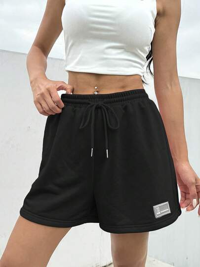 SHEIN EZwear شورت رياضي واسع باللون الوردي وخصر قابل للشد وتفصيل الرقع الصيفي