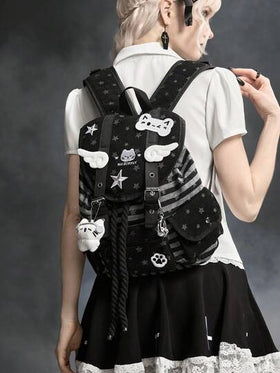 ROMWE Grunge Punk 1 حقيبة ظهر كبيرة السعة مناسبة للتنقل والمدرسة والعطلات، بتصميم نجمي مزين بأجنحة قطة وبصمات قدم القطة، بطراز كلية بانك، ذات جيوب متعددة، بخطوط وألوان أسود وأبيض، مناسبة للجنسين وأنيقة وعصرية
