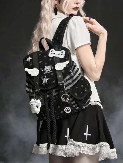 ROMWE Grunge Punk 1 حقيبة ظهر كبيرة السعة مناسبة للتنقل والمدرسة والعطلات، بتصميم نجمي مزين بأجنحة قطة وبصمات قدم القطة، بطراز كلية بانك، ذات جيوب متعددة، بخطوط وألوان أسود وأبيض، مناسبة للجنسين وأنيقة وعصرية