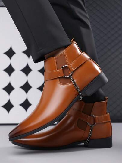 زوج من بوت تشيلسي الكاجوال للرجال ذات الجزء العلوي من جلد البولي يوريثان والنعل المطاطي، ذات رقبة متوسطة الارتفاع وأصبع مدبب، ذات كعب منخفض مريح للاستخدام في الأعمال