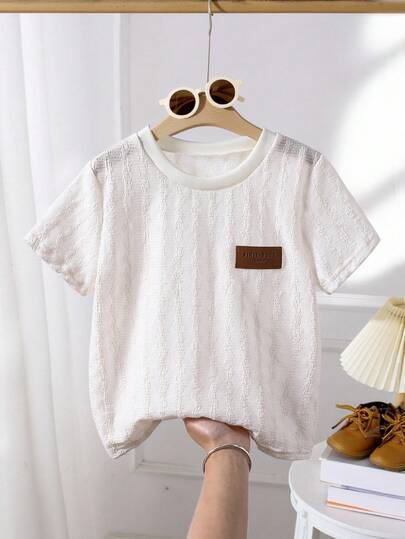 SHEIN ملابس علوية قصير الأكمام كاجوال مصنوع من قماش جيرسيه للأولاد الصغار، لون سادة متعدد الاستخدامات بياقة طاقم، مناسب للارتداء اليومي والخروجات الترفيهية، مجموعة صيفية جديدة