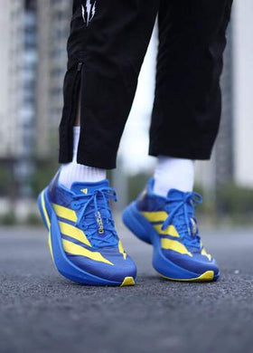 Adidas حذاء أديداس أديزيرو بوسطن 13 الرياضي المريح والمتعدد الاستخدامات للرجال، لون أزرق