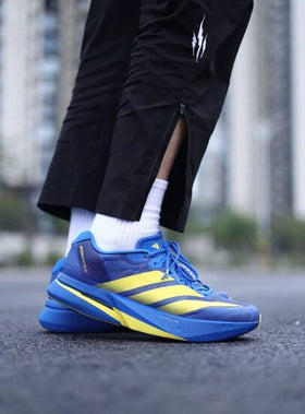 Adidas حذاء أديداس أديزيرو بوسطن 13 الرياضي المريح والمتعدد الاستخدامات للرجال، لون أزرق