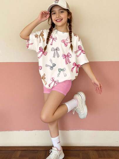 Emery Rose Kids Emery Rose Kids مجموعة بقطعتين من تي-شيرت بأكمام قصيرة مريح وبتصميم فرفشة وشورت صيفي لفتيات المراهقات