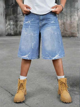 SHEIN شورت جينز واسع الساق بتصميم نمط شارع مبسط بقصة رجعية ممزقة وملمس مهترئ للأولاد المراهقين، ملابس يومية للأولاد المراهقين وملابس ربيع وصيف للحفلات والمهرجانات والملابس الشارعية