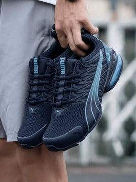 Puma أحذية رياضية كاجوال منخفضة الكاحل مريحة من بوما فولتايك إيفو للرجال، باللون الأسود والأزرق