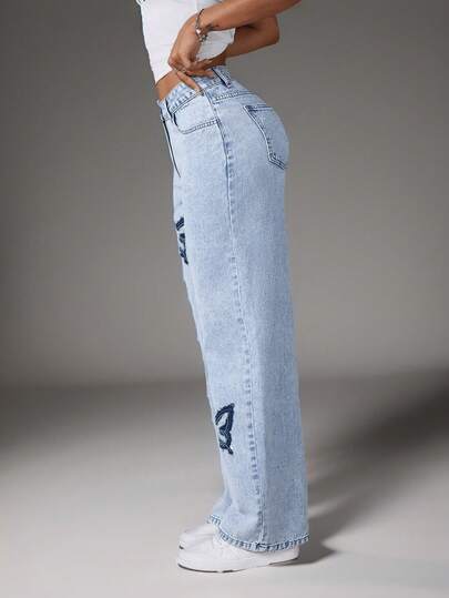 SHEIN EZwear جينز بطول ساق مستقيمة ذو خصر منخفض مغسول مطبوع عليه طبعة فراشة للنساء