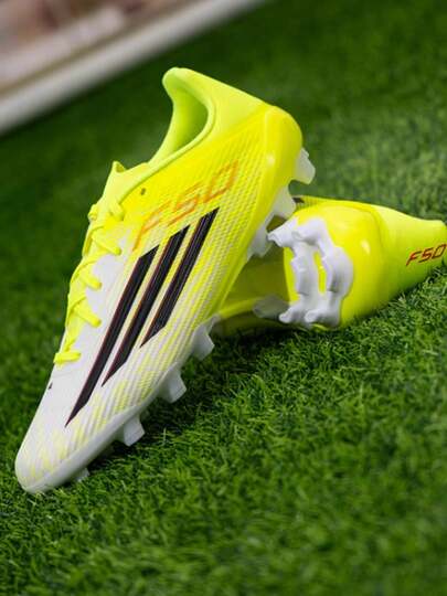 Adidas حذاء كرة قدم أديداس F50 League 2G/3G للعشب الصناعي، مريح ومناسب للجنسين، باللون الأصفر الفلوري والأسود