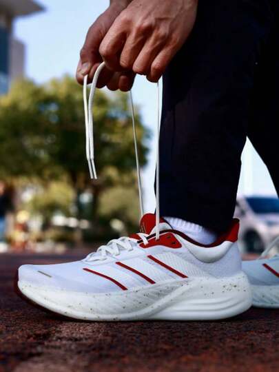 Adidas حذاء أديداس كوشنوفا للسفر، خفيف الوزن للغاية، مصنوع من قماش مريح، مناسب للجري على الطرق الوعرة، للجنسين، أبيض وأحمر