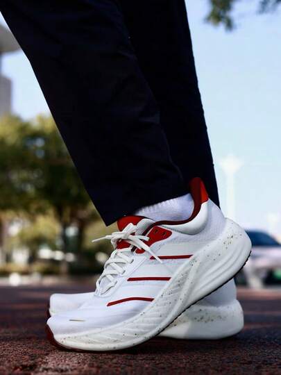 Adidas حذاء أديداس كوشنوفا للسفر، خفيف الوزن للغاية، مصنوع من قماش مريح، مناسب للجري على الطرق الوعرة، للجنسين، أبيض وأحمر