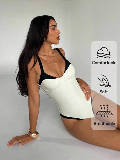 Aloruh بدلة سباحة بتصميم قطعة واحدة أنيق للنساء ، أبيض وأسود ، ياقة عميقة، شق طويل وجذاب، مناسبة للشاطئ والعطلات الصيفية