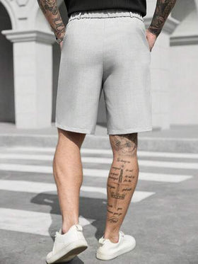 Manfinity CasualCool شورت رجالي كاجوال بجيب مائل، شورت رسمي للأعمال، فضفاض، طول الركبة، بارد، لون أحادي، طراز صيفي أساسي