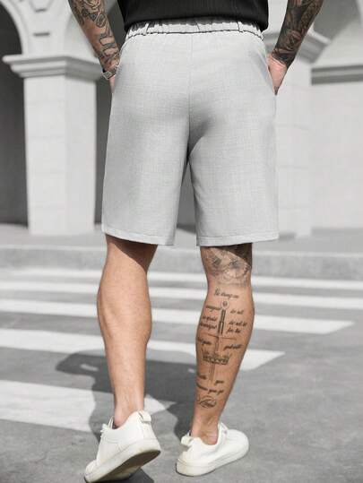 Manfinity CasualCool شورت رجالي كاجوال بجيب مائل، شورت رسمي للأعمال، فضفاض، طول الركبة، بارد، لون أحادي، طراز صيفي أساسي