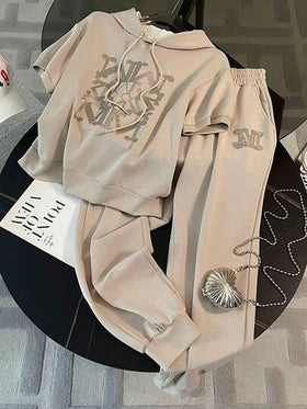 SHEIN مجموعة هوديي مقصوص مطابق + بنطلون كاجوال بجيب مائل
