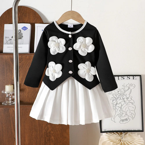 موضة 2025 خريف/شتاء جديد بنات' طقم: black أكمام طويلةd توب with flowers for children+white قصير جيب 2-piece طقم
