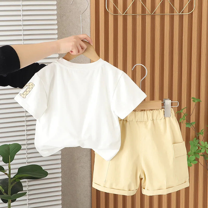 موضة 2025 جديد أولاد صيف pullover بدلة كاجوال طقم قطعتين with round neck أكمام قصيرة and printed cotton fabric for little ones