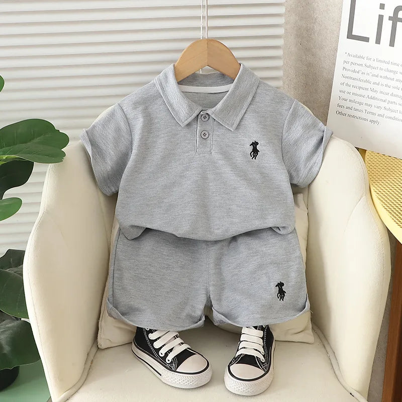 موضة 2025 جديد أولاد صيف بدلة foreign ستايل cotton printed child sets with solid lapel أكمام قصيرة خفيف clothing for أطفال