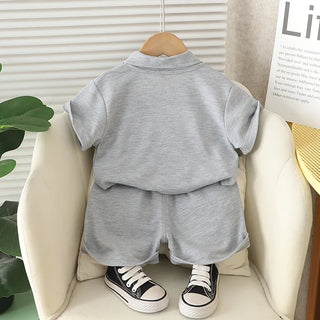 موضة 2025 جديد أولاد صيف بدلة foreign ستايل cotton printed child sets with solid lapel أكمام قصيرة خفيف clothing for أطفال